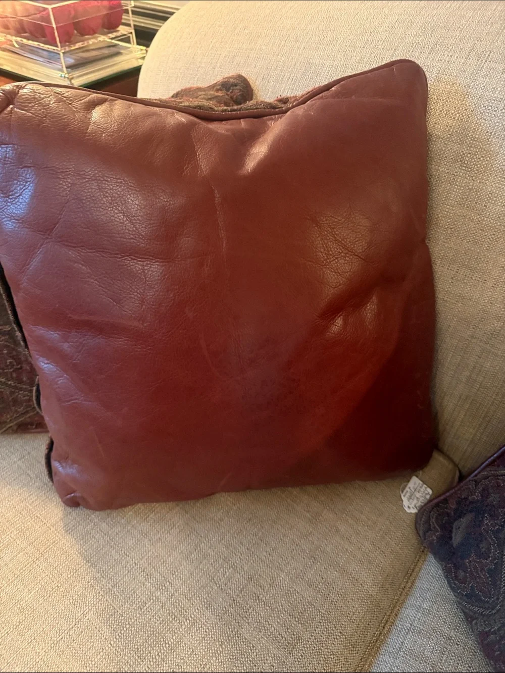 Ralph inspired leather backed with a brown/navy/0live green pillows. Set of 4
